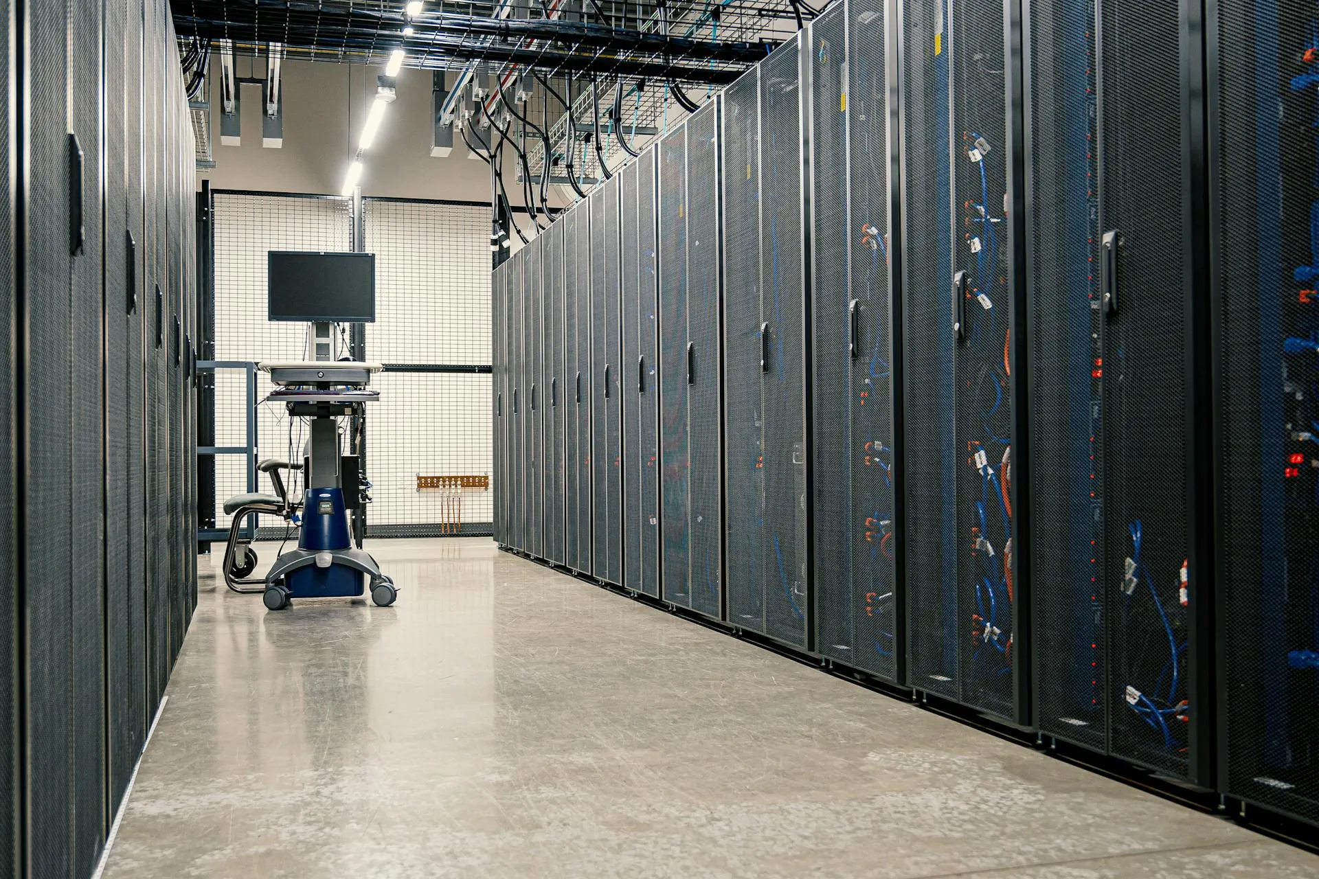 Modern data center showing comprehensive security monitoring and management systems